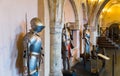 Old castle interior with knight`s armor, Europe