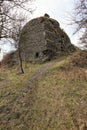 Old castle ruined walls on the grassy hill Royalty Free Stock Photo