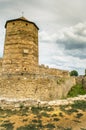 Old castle ruins in the green grass