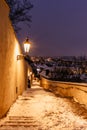 Old Castle Stairs at night, Prague, Czech Republic.Beautiful spectacular winter panorama of Vltava river and historical buildings. Royalty Free Stock Photo