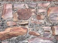 Old castle stone wall as a background or texture. Part of the wall. Royalty Free Stock Photo