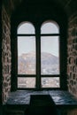 Old castle window overlooking the fortress, middle ages Royalty Free Stock Photo