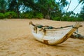 The old catamaran boat on the beach , Hikkaduwa, Sri Lanka.