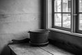 The old cauldron on a table in farmhouse Royalty Free Stock Photo