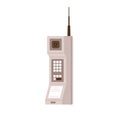 Old cell phone with antenna. First portable mobile telephone of 1973. Retro wireless big cellphone of 70s, 80s, handheld