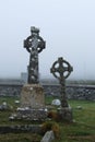 An old Celtic crosses wrapped in fog