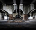 Old cement and brick arches in diminishing perspective