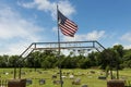 Old cemetery with the American Flag at the entrance in the State of Texas, USA Royalty Free Stock Photo