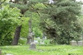 Old cemetery with headstones and trees Royalty Free Stock Photo