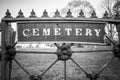 Old cemetery and tombstones in rural town, black and white Royalty Free Stock Photo