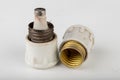 Old ceramic electric fuse. Blown and badly repaired security for energy Royalty Free Stock Photo