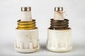 Old ceramic electric fuse. Blown and badly repaired security for energy Royalty Free Stock Photo