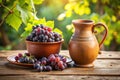Old Ceramic Jug, Mug, and Fresh Grapes on Wooden Table Royalty Free Stock Photo