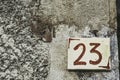 Old ceramic street number 23 decorative plate