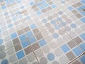 An old ceramic tile floor with a blue pattern can be used as a texture background Royalty Free Stock Photo