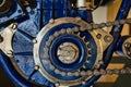 Old chain driven early motorcycle sprocket and roller chain Royalty Free Stock Photo