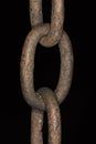 Old chain link in detail with black background Royalty Free Stock Photo