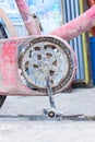 Old chain wheel of bicycle with dry mud Royalty Free Stock Photo