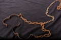 Old chains or handcuffs used to hold prisoners or slaves