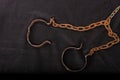 Old chains or handcuffs used to hold prisoners or slaves