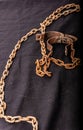 Old chains or handcuffs used to hold prisoners or slaves