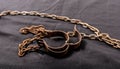 Old chains or handcuffs used to hold prisoners or slaves