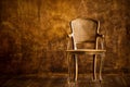 Old chair on a brown wall background. Royalty Free Stock Photo