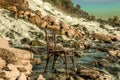 chair near the not a hige waterfall