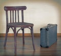 Old chair and an old suitcase Royalty Free Stock Photo