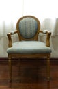 Old chair with white curtains in the room Royalty Free Stock Photo