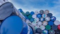 Old chemical barrels. Big stack of blue oil drum against sky. Steel oil tank. Toxic waste warehouse. Hazard chemical barrel with Royalty Free Stock Photo