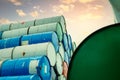 Old chemical barrels stack. Red, green, and blue chemical drum. Steel tank of flammable liquid. Hazard chemical barrel. Industrial