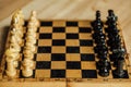Old chess board set for a new game at home Royalty Free Stock Photo