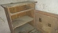 A old chest of drawers in an abandoned house Royalty Free Stock Photo