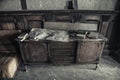 An old chest of drawers in a room of an old abandoned manor.