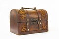 An old chest made of wood and leather with an iron handle and lock Royalty Free Stock Photo
