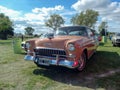 Old 1955 Chevrolet Chevy Bel Air sedan two door on the lawn. Classic car show. Sunny day Royalty Free Stock Photo