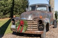 Old Chevy Pick-up Truck decorated for the Christmas Holidays Royalty Free Stock Photo