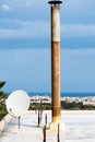 Old chimney and satellite Royalty Free Stock Photo