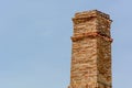 Old chimney a sunny day in a blue sky Royalty Free Stock Photo