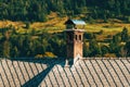 Old chimney on top of the typical slovenian mountain house Royalty Free Stock Photo