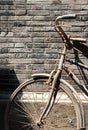 Old Chinese bike against brick wall Royalty Free Stock Photo