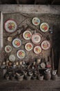 Old Chinese decorative plates, trays and mortars, vintage and antique shop in Takua pa, Thailand