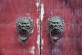 Old chinese door. Old doorknob on vintage red door in China Royalty Free Stock Photo