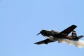 Old Chinese fighter plane flying and smoking