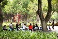 Old chinese people meet friends and sing song with playing classic musical instruments concert in park at Guangdong, China