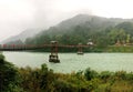 The old Chinese style bridge on the river of Dujiangyan, Sichuan, China Royalty Free Stock Photo