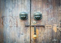 Old Chinese style door and mythical wild animal head door handle