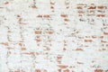 Old chipped white brick wall texture background. Vintage Wide Old Red White Brick Wall Texture Background. whitewashed grungy Royalty Free Stock Photo