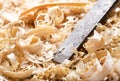Old chisel and wood shavings Royalty Free Stock Photo